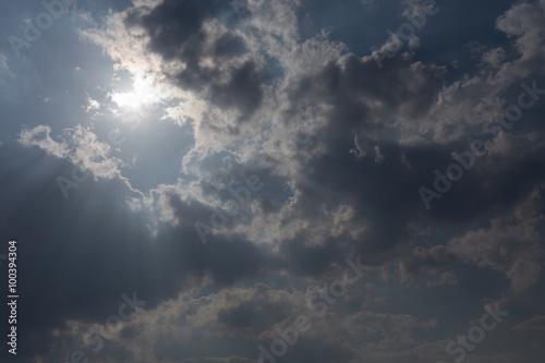 sunbeam through the clouds of sunlight in blue sky background