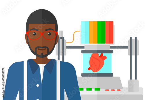 Man with three D printer.