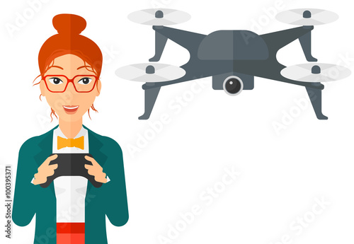 Woman flying drone.