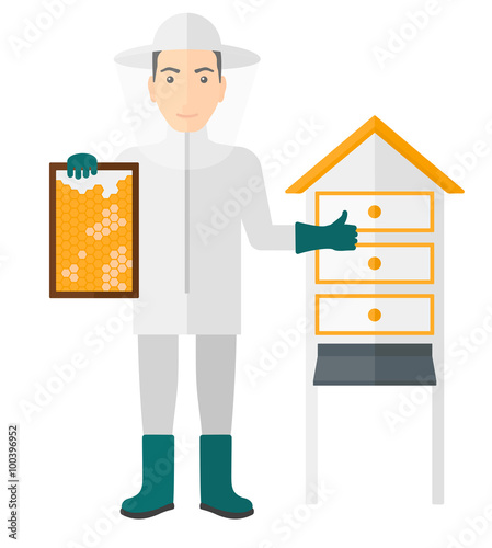 Bee-keeper at apiary.