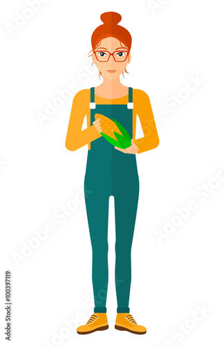 Farmer holding corn.