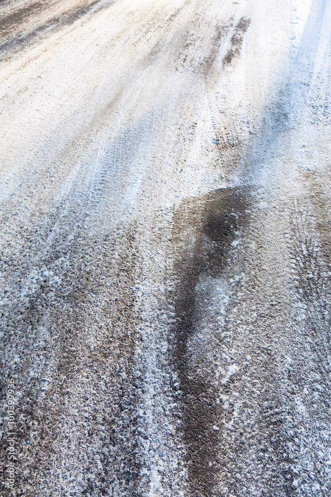snow covered slippery asphalt road in winter snow covered slippery asphalt road in winter