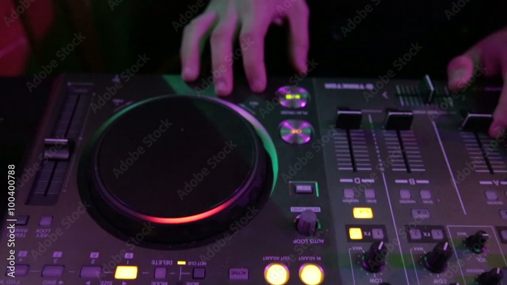 Consolle Dj in a Disco Club. Shallow Deep of Field. Pink Lights. 