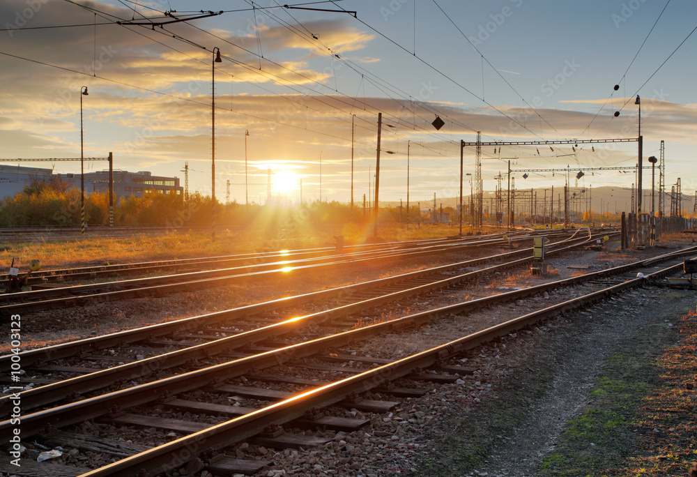 Railway, railroad lines at sunset