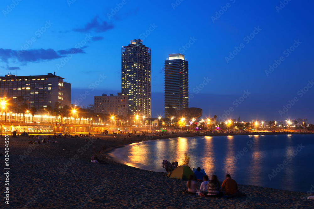Somorrostro Beach  in summer twilight. Barcelona - obrazy, fototapety, plakaty 