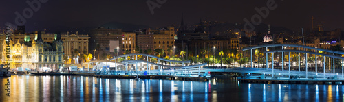 panoramic view of bridge at Port in autumn night. Barcelona