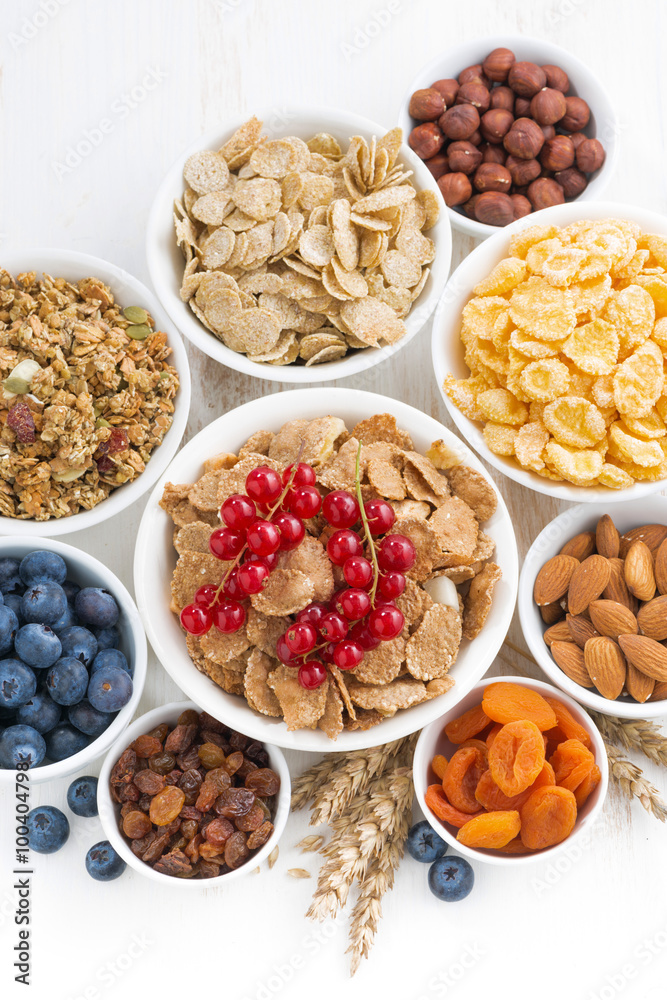 assortment of different breakfast cereal, dried fruit assortment of different breakfast cereal, dried fruit