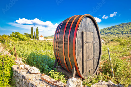 Wooden barrel on Hvar plains landscape