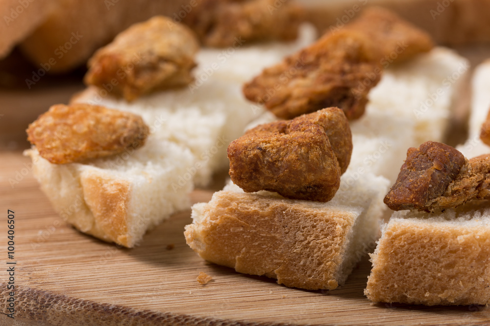 Greaves on the slices toast bread Greaves on the slices toast bread