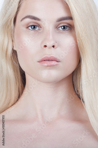 Portrait of beautiful young blond woman with clean face