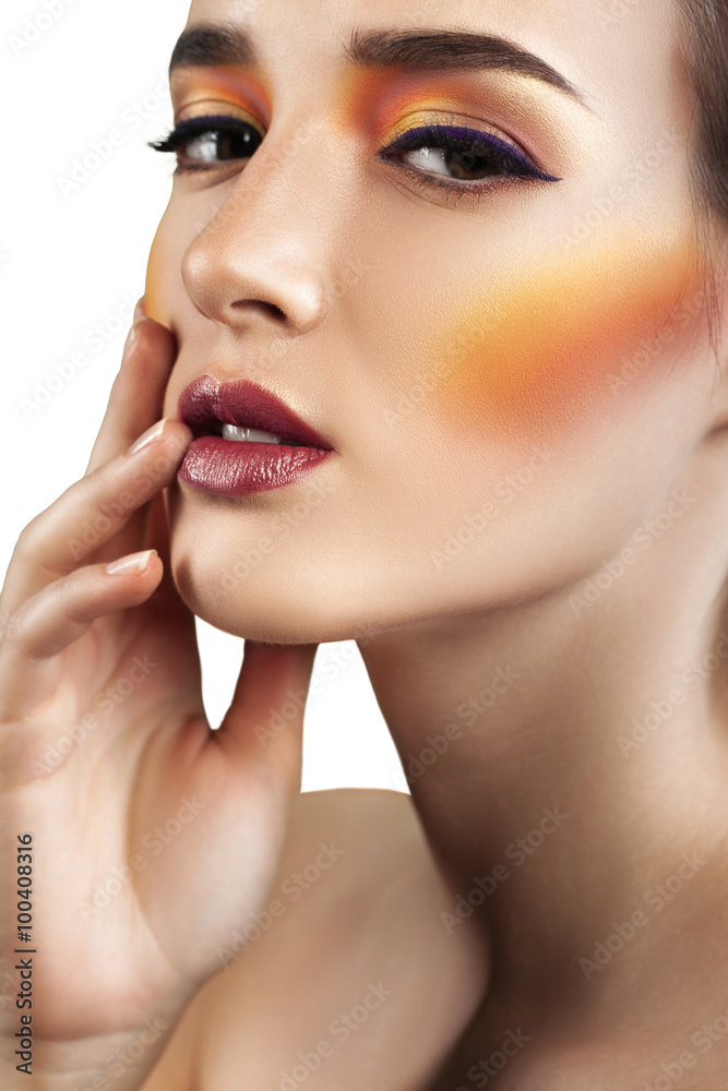 Closeup beauty portrait of attractive model face with bright mak Closeup beauty portrait of attractive model face with bright mak