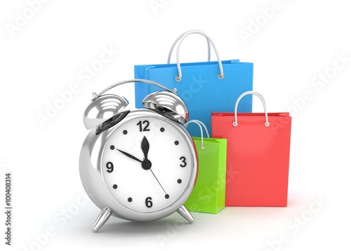 alarm clock and shopping bag (time to buy concept)