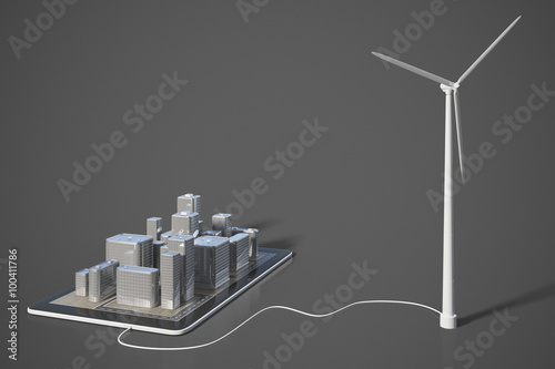Green energy concept with smartphone with 3D buildings and windm photo