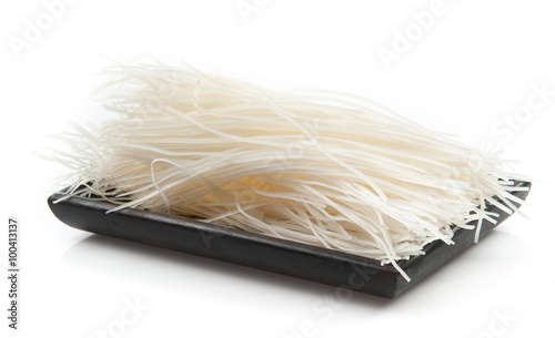died rice noodles on white background photo