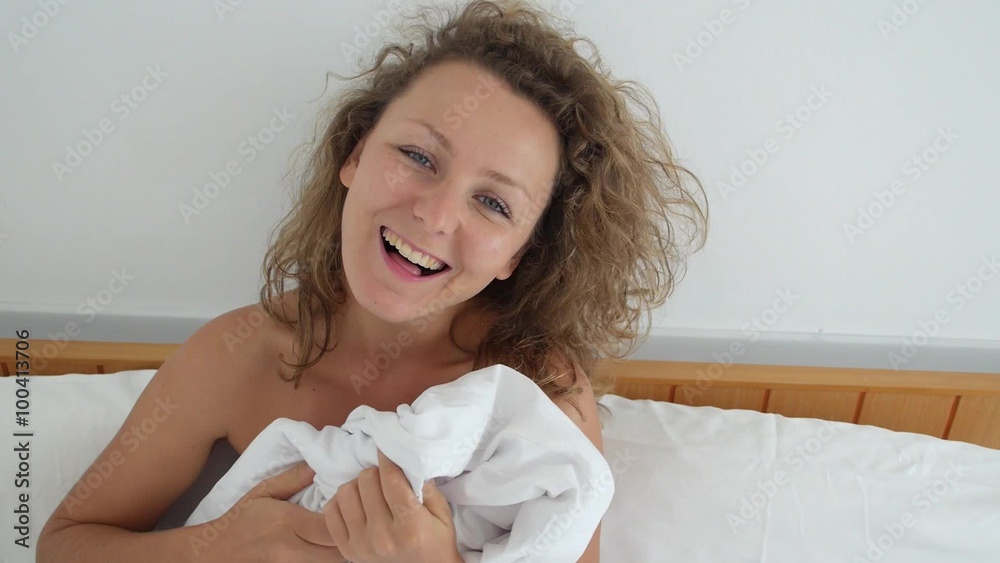 Happy Funny Girl Flirts and Hides her Face in Bed Happy Funny Girl Flirts and Hides her Face in Bed