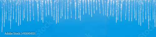 Icicles on a blue 