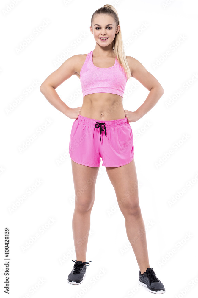 Full length pose of young trainer in sportswear Full length pose of young trainer in sportswear