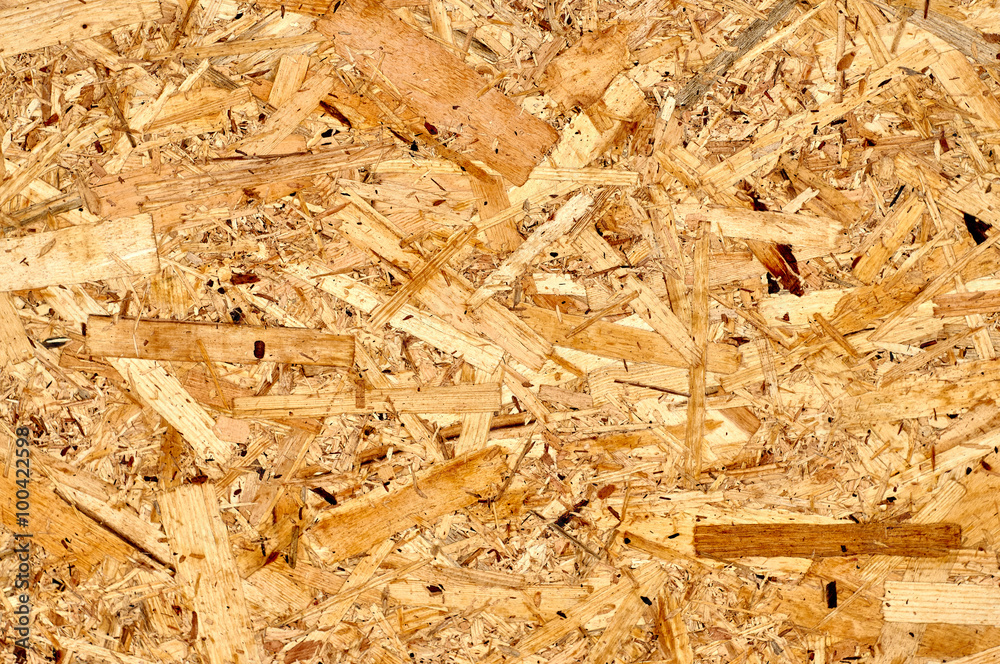 Close up of plywood or chipboard as a textured background image Close up of plywood or chipboard as a textured background image