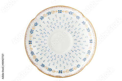 Old vintage porcelain plate on the white background