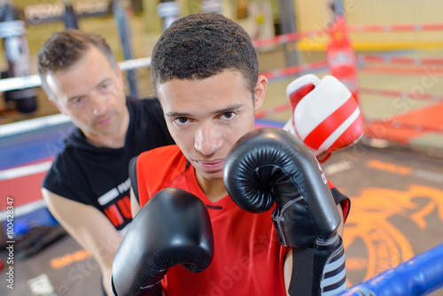 Young man in boxing ring © auremar