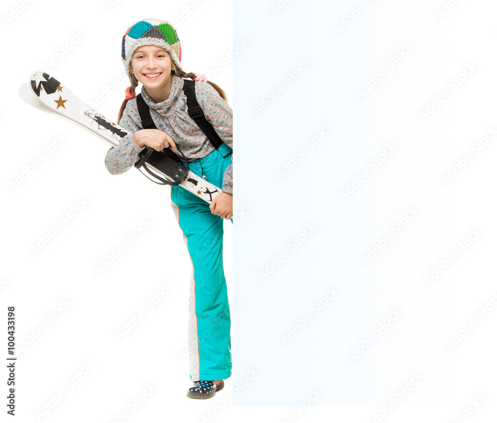 little girl with skis peeking from behind an empty blank little girl with skis peeking from behind an empty blank