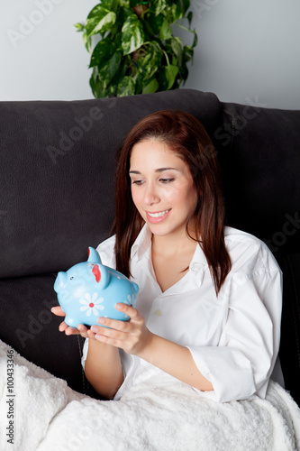 Young woman on her couch thinking about his future