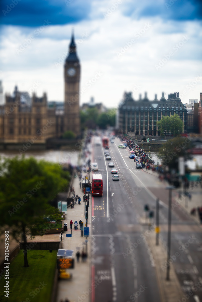 Westminster bridge with big ben and house of parliament in the background.
