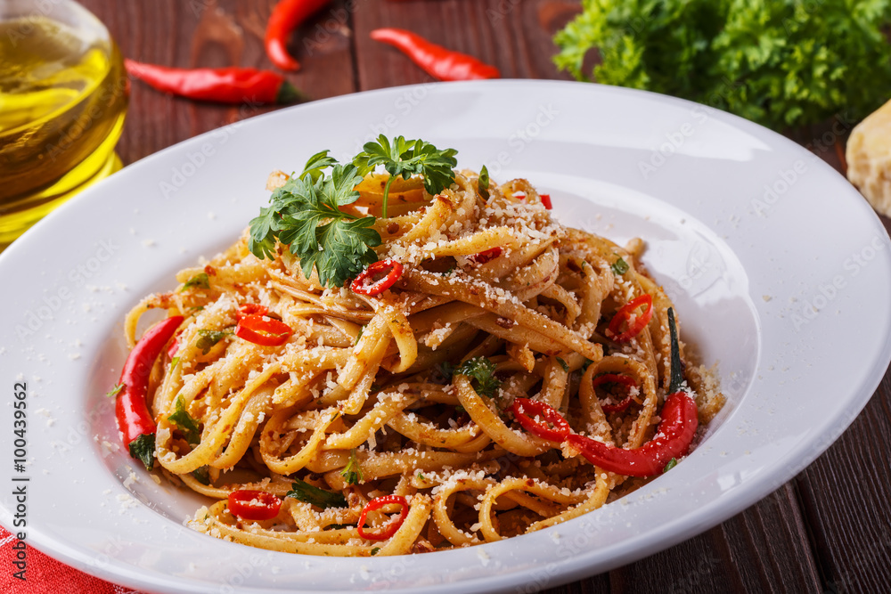 Homemade linguine pasta in arrabbiata sauce. Homemade linguine pasta in arrabbiata sauce.
