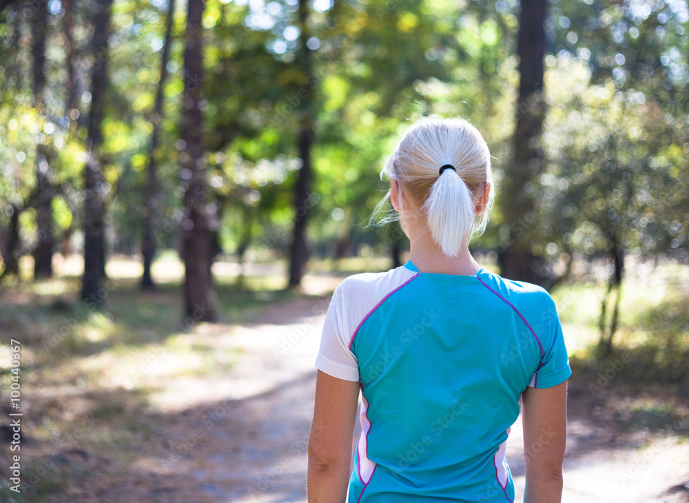 Caucasian female sport fitness model jogging training for marathon during outdoor workout Caucasian female sport fitness model jogging training for marathon during outdoor workout
