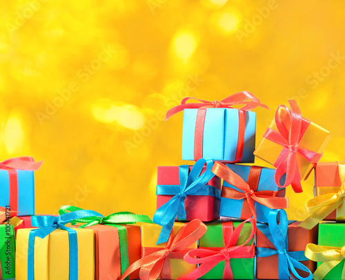 Colorful gifts on a bokeh background