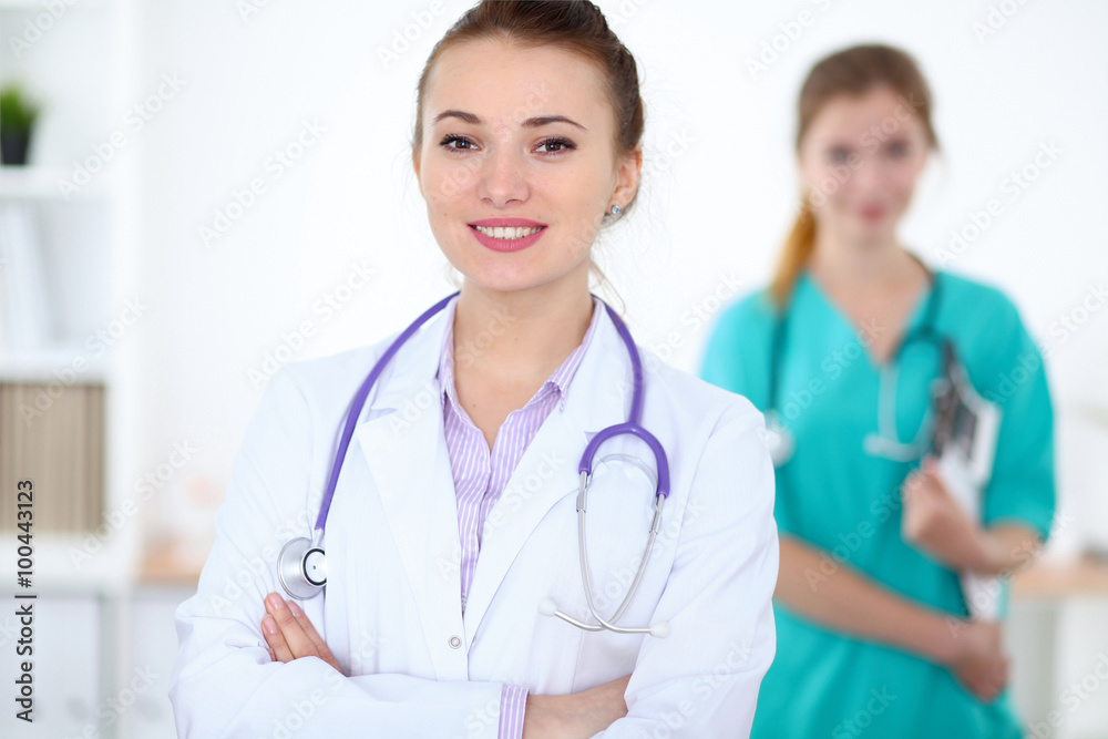 Portrait of young female  doctor in a hospital