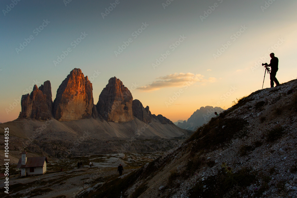Photographer taking pictures to National Park Tre Cime di Lavare