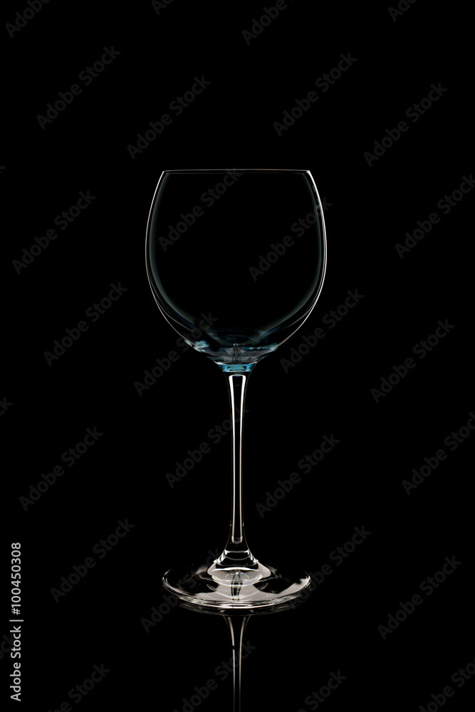 elegant wine glass isolated on a black background