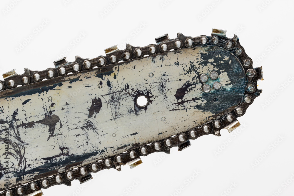Obraz premium Worn chanisaw blade end close up showing bar, chain and grease