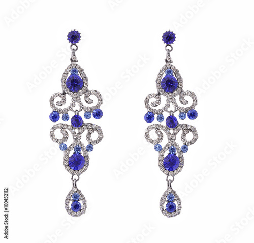 long earring with blue stones and zircons on a white background