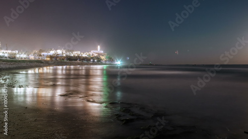 Wallpaper Mural Panning shot of Moon setting into the ocean near an Israeli city Torontodigital.ca