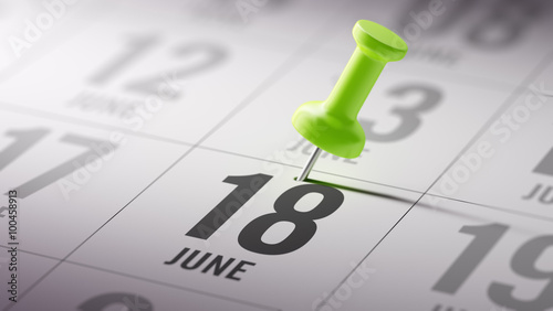 Photos June 18 written on a calendar to remind you an important appoint