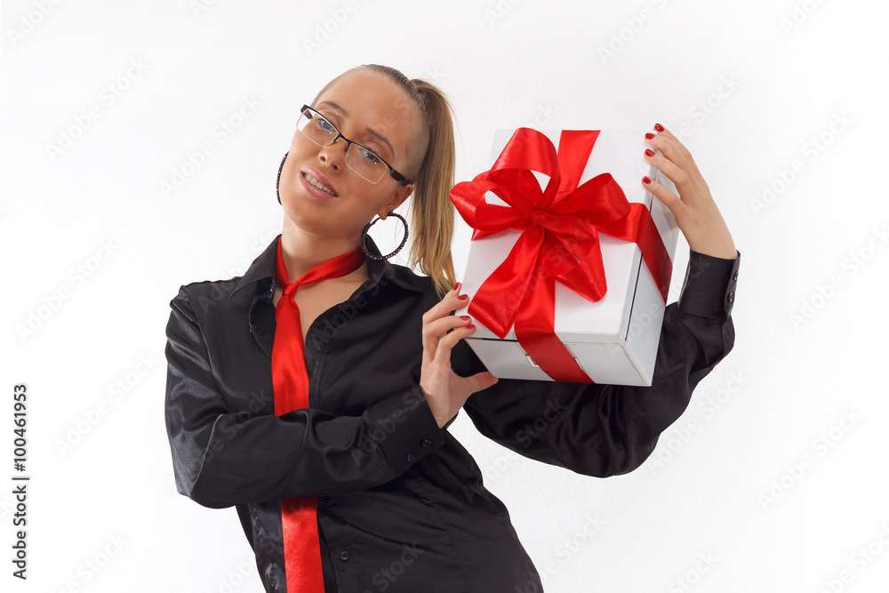 Sexy business lady holding gift box with red ribbon Sexy business lady holding gift box with red ribbon