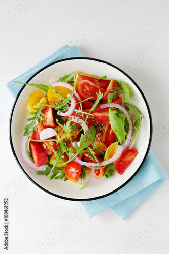 light tomato salad on plate