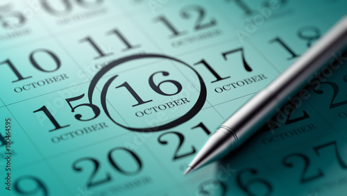 Fotografie October 16 written on a calendar to remind you an important appo