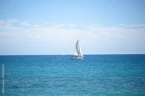 Beautiful white sailing boat offshore
