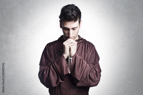 Fototapeta young friar praying