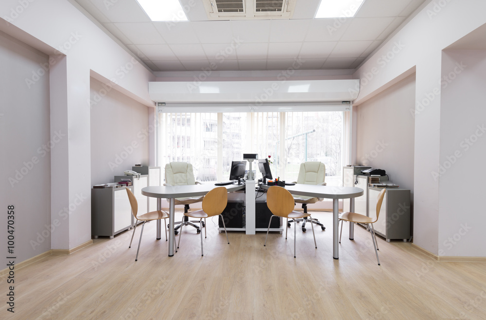 Bright modern office with two desks Bright modern office with two desks