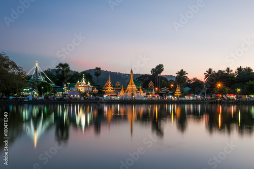 Reflection of Wat Chong Kham in the lake after sunset