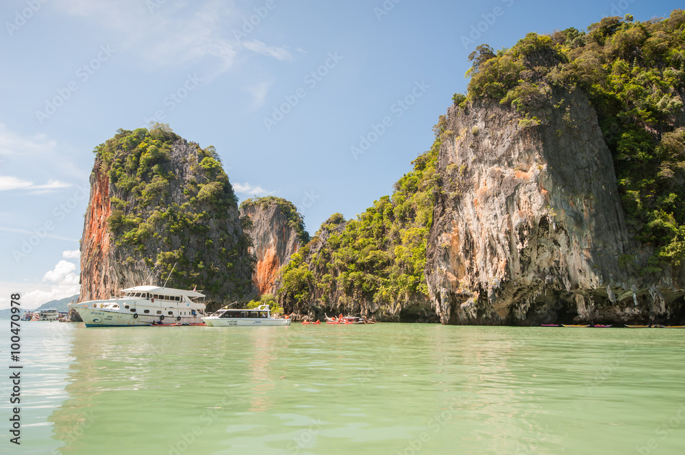 Yachts mored at island in Phang Nga Bay