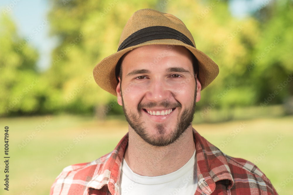 portrait of a trendy young man in the nature