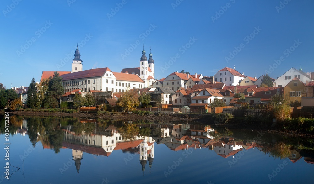 Morning view of Telc or Teltsch town mirroring in lake