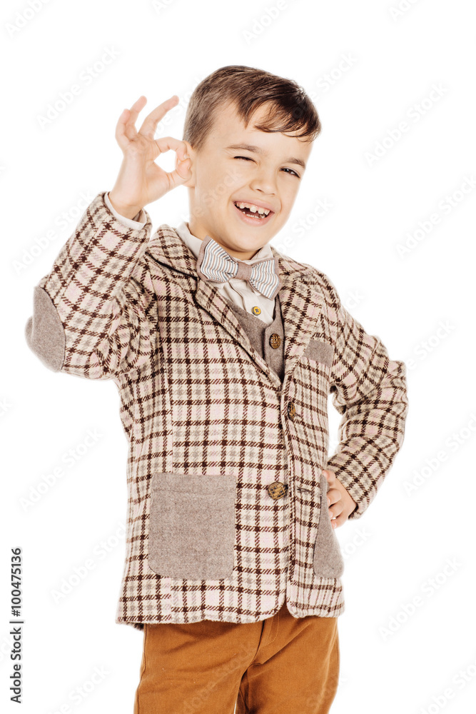 Portrait adorable young happy boy looking at camera isolated on Portrait adorable young happy boy looking at camera isolated on
