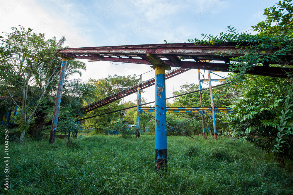 Rusty decayed roller coaster tracks at Yangon abandoned amusement park, Myanmar Rusty decayed roller coaster tracks at Yangon abandoned amusement park, Myanmar