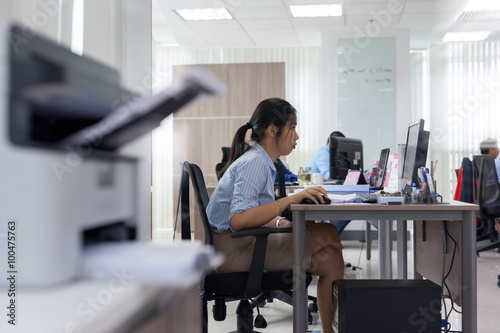Asian businesswoman working computer sitting office